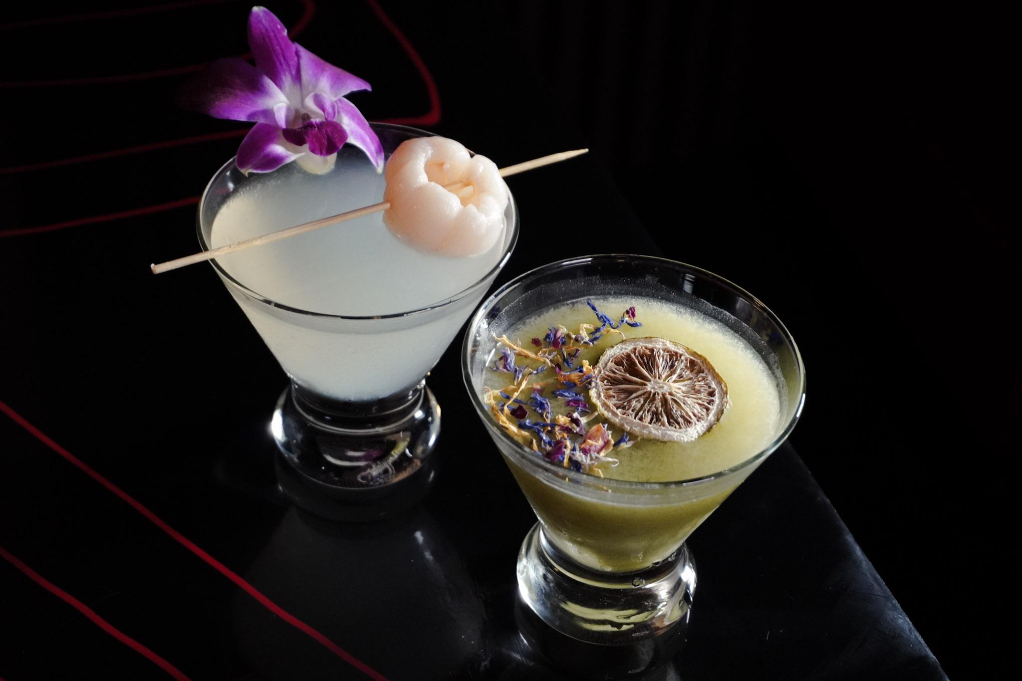 Lychee orchid cocktails in Tokyo Sushi Speakeasy's moody room.