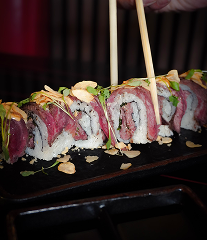 Wagyu Truffle Roll with wagyu slices, truffle mayo, and crispy garlic